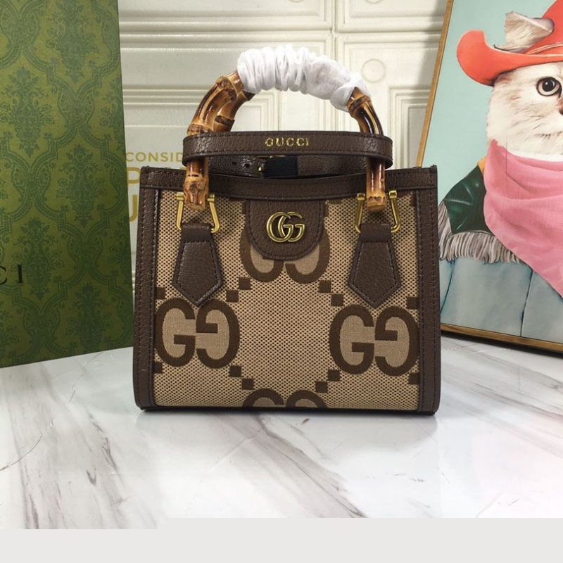 G*u*i top handle bags